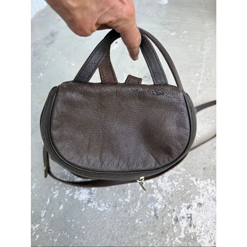 Long champ pebble leather backpack
